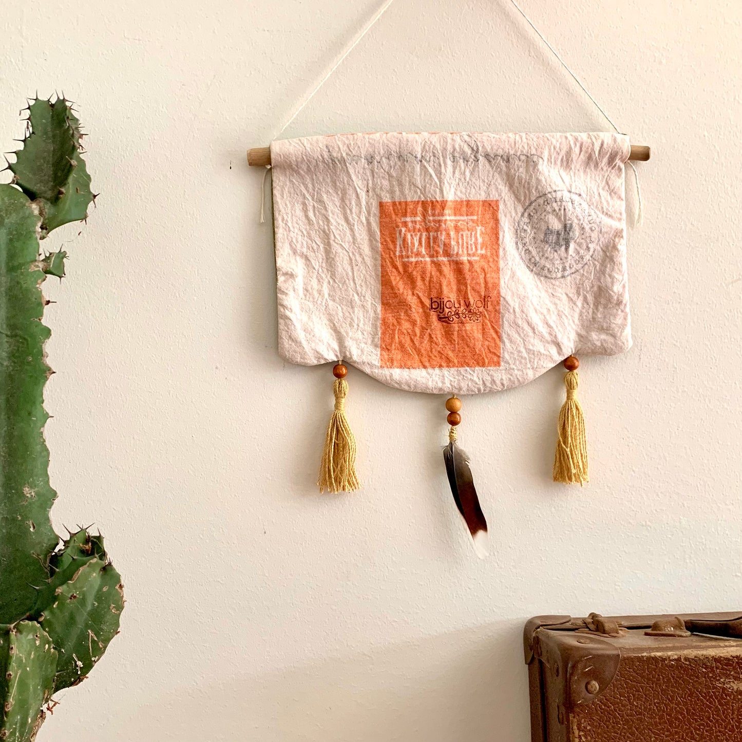 Green toned Soleil wall hanging
