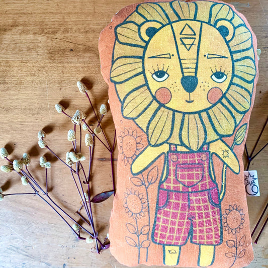 Dandy lion earthy rust linen cushion