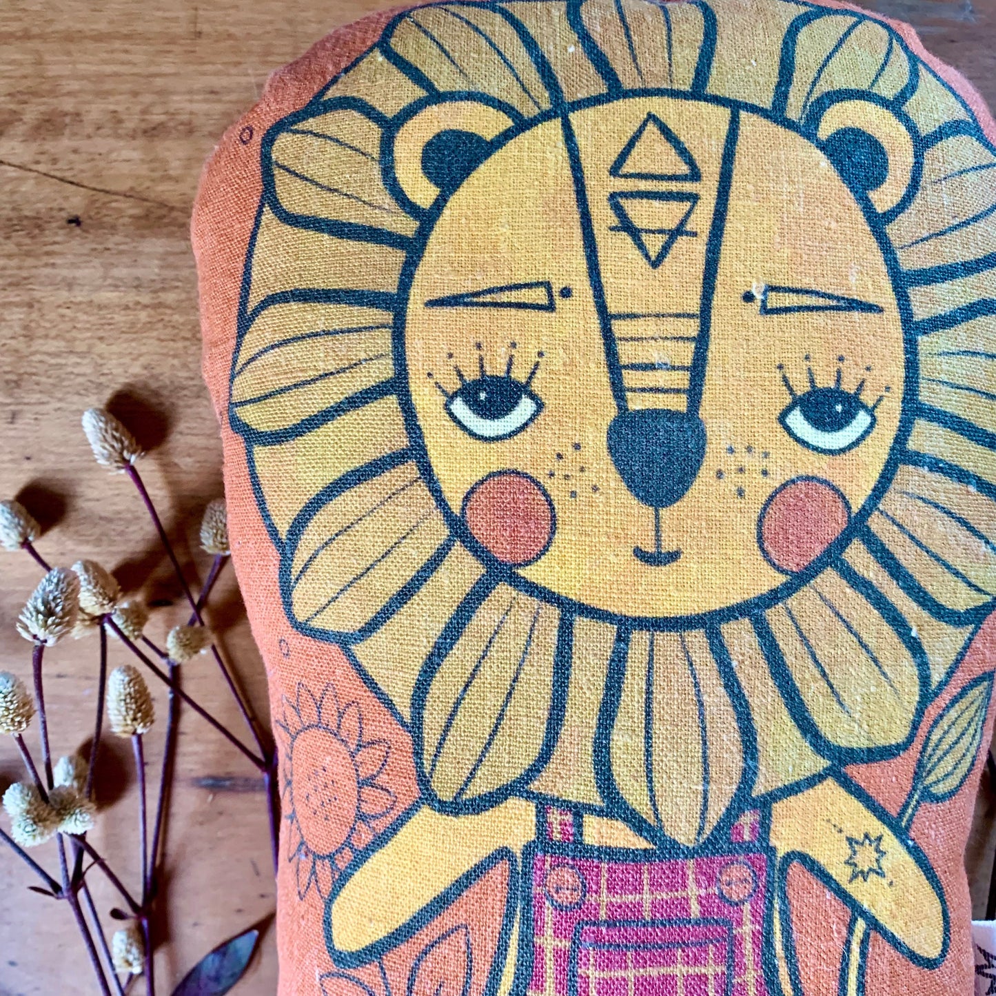 Dandy lion earthy rust linen cushion