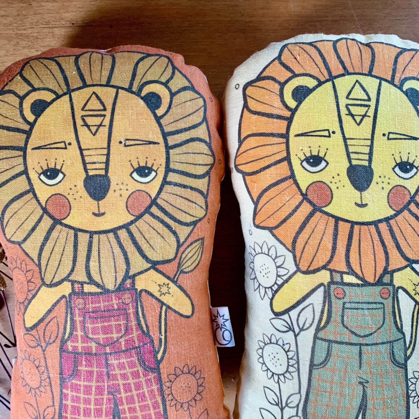 Dandy lion earthy rust linen cushion