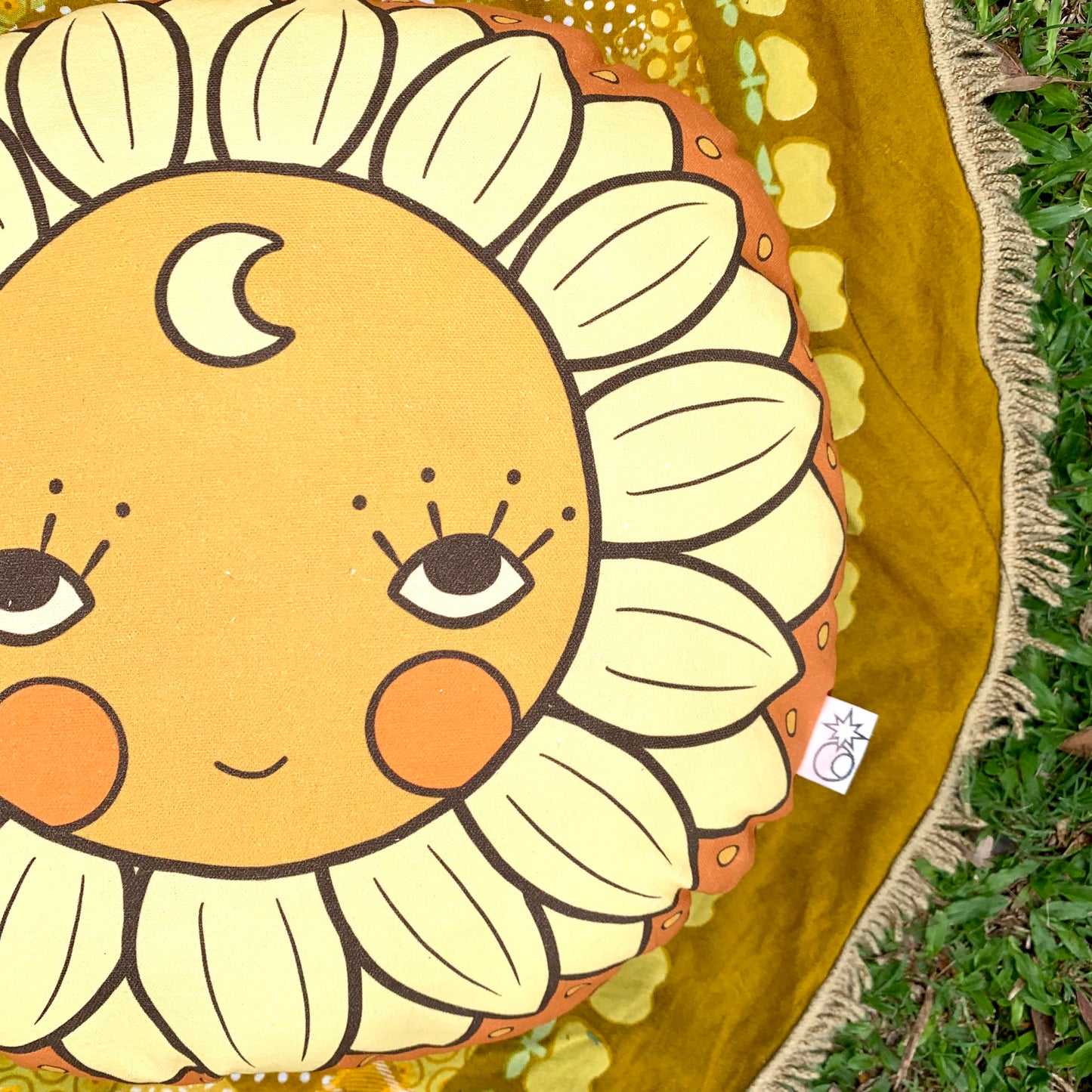 Sunflower face round organic canvas cushion in sunshine