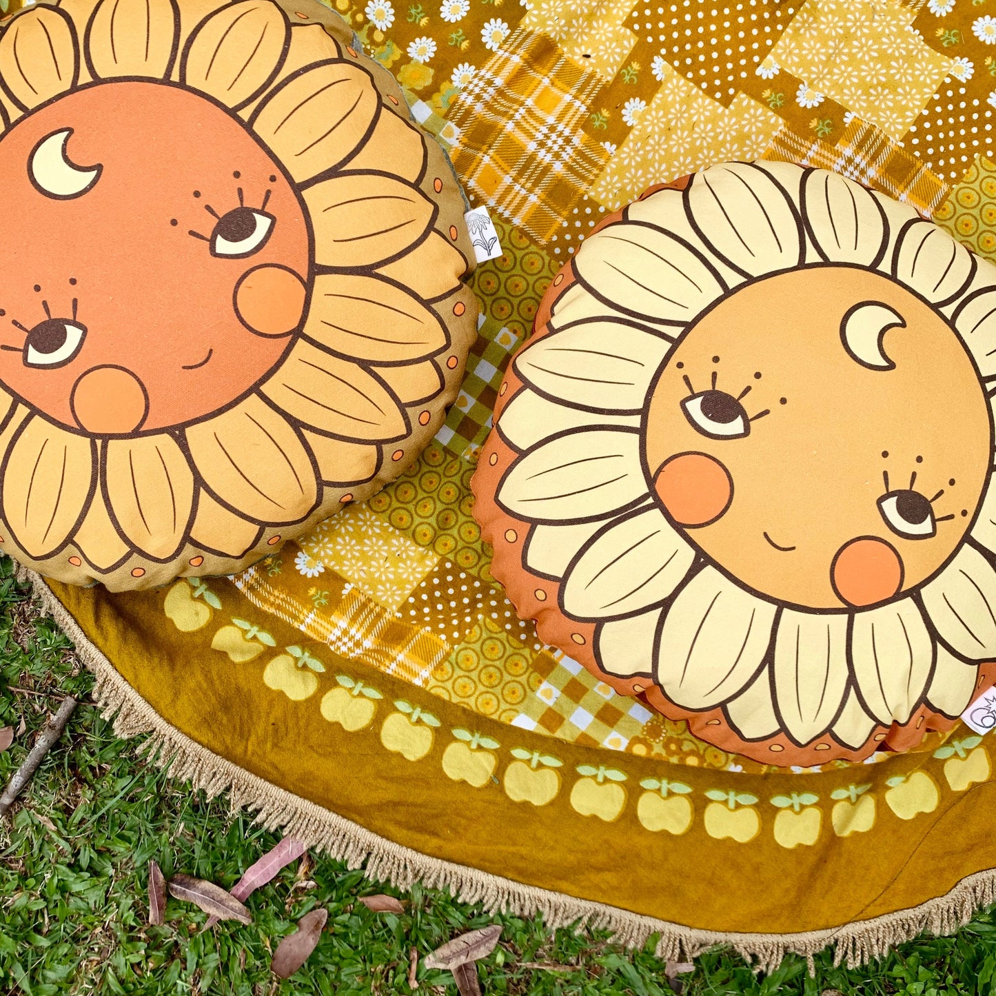 Sunflower face round organic canvas cushion in sunshine