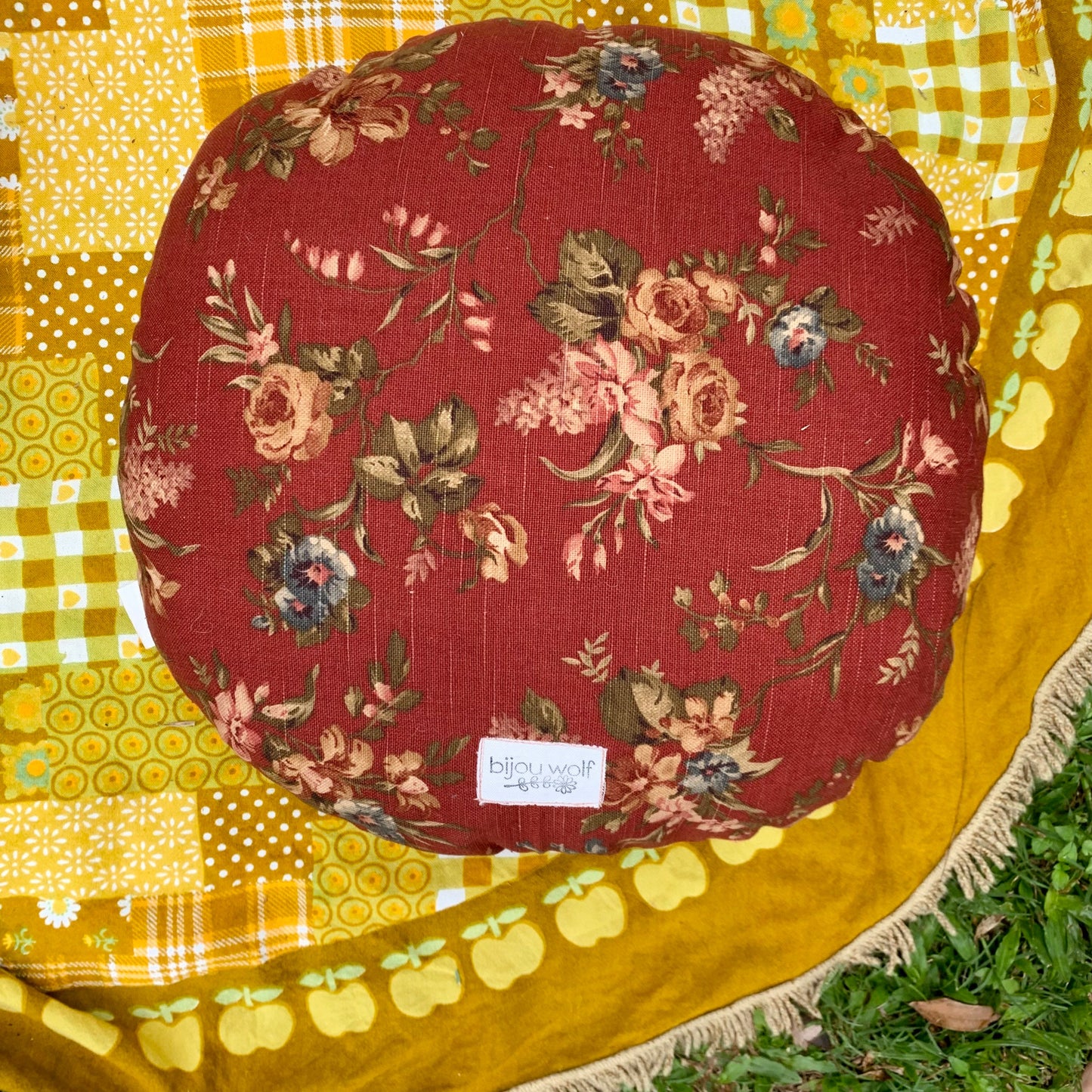 Sunflower face round organic canvas cushion in sunshine