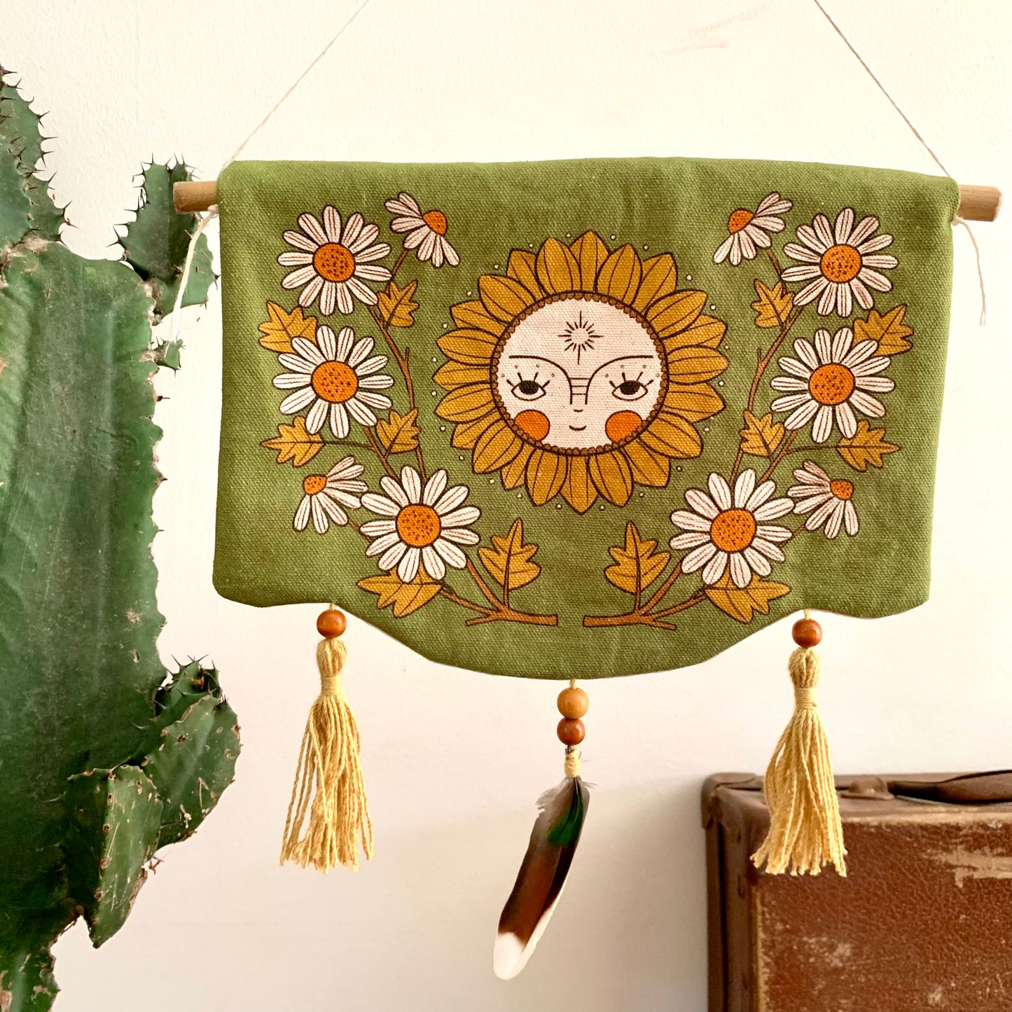 Green toned Soleil wall hanging