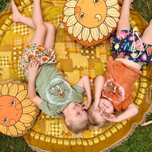 Sunflower face organic canvas round cushion in shade