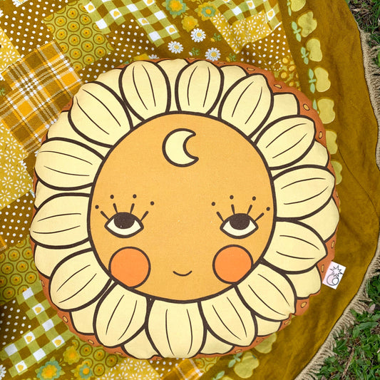 Sunflower face round organic canvas cushion in sunshine