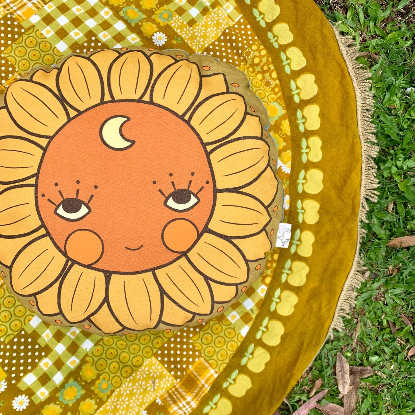 Sunflower face organic canvas round cushion in shade